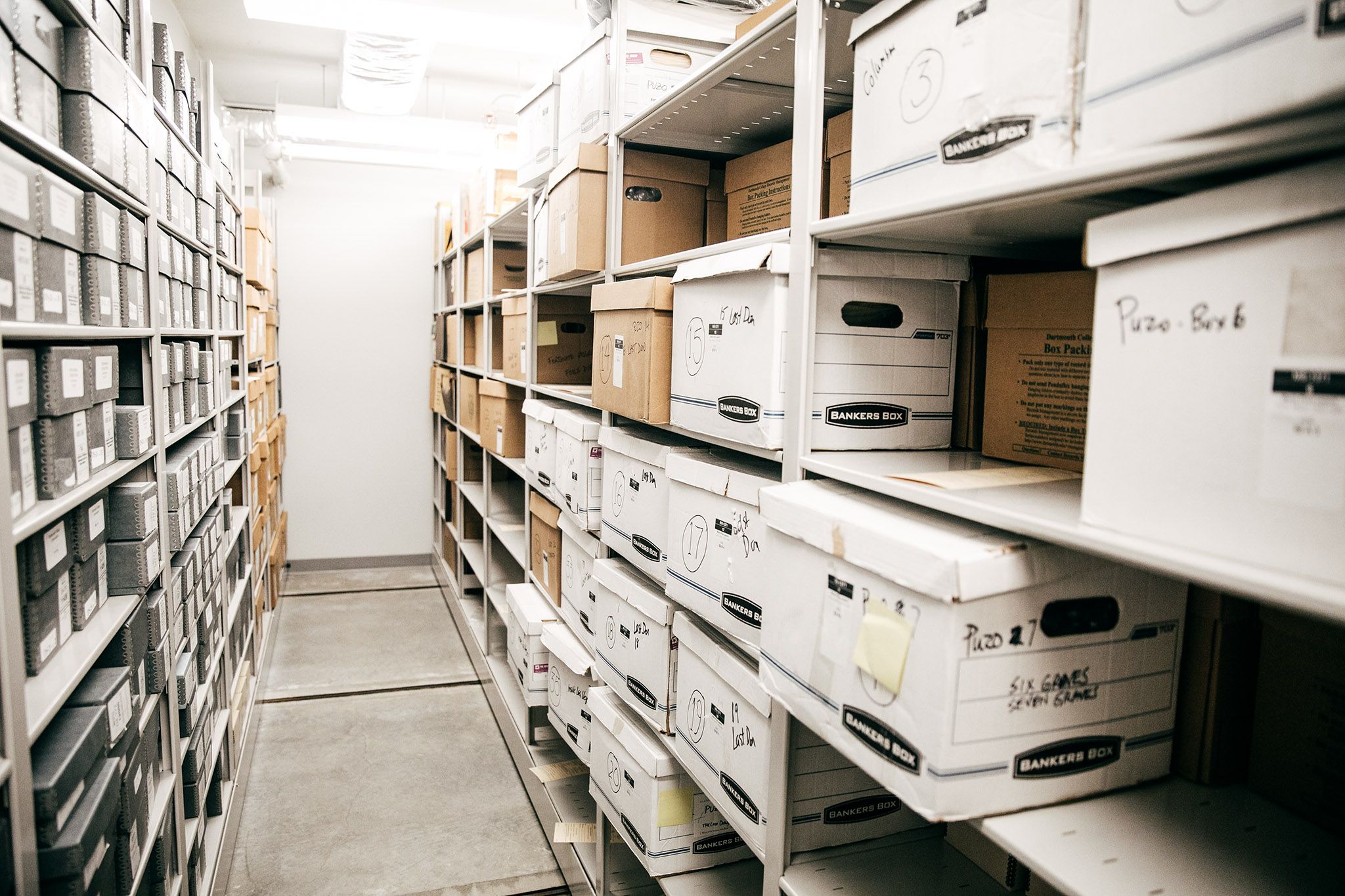 Boxes on shelves in library