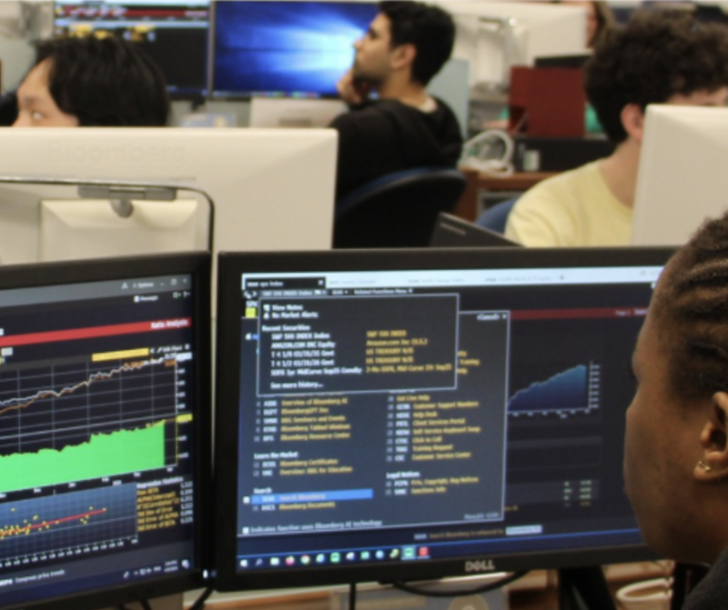 student uses a bloomberg terminal at Feldberg Library