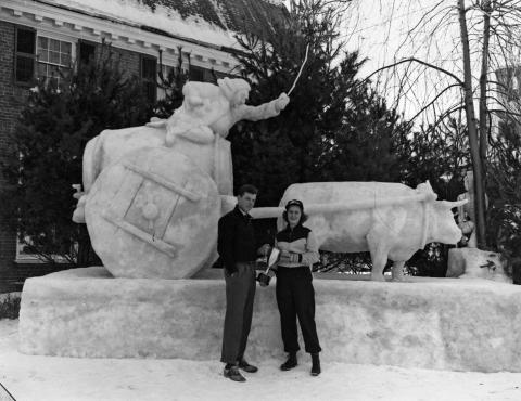 Dorothy Gardner 1939 Winter Carnival Queen, with Nat Sample, Delta Tau Delta '40, in front of snow sculpture.