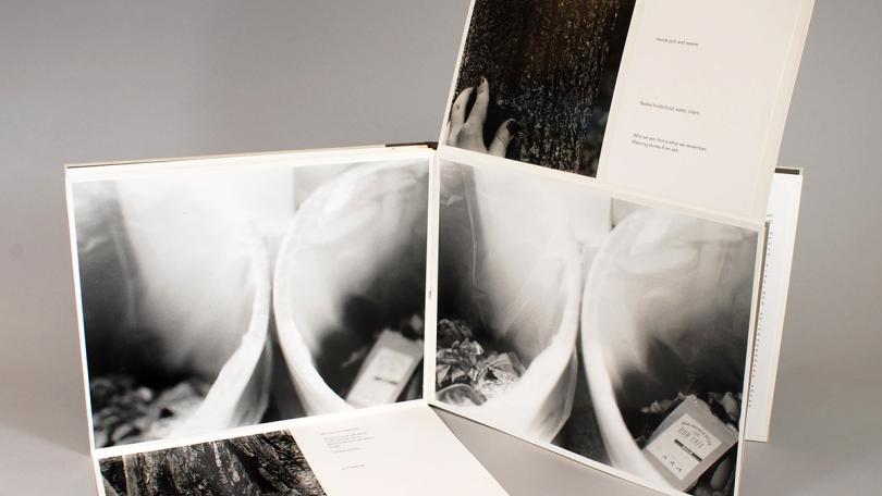 black and white photo book with binding opening different ways