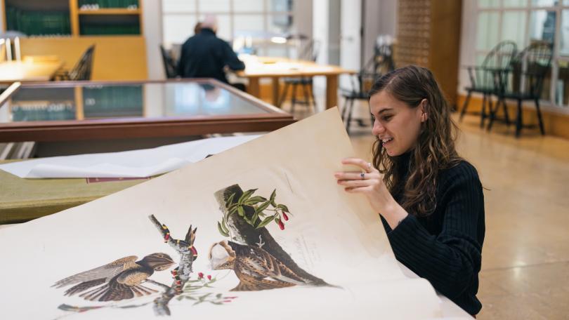 Elizabeth Hadley views a first print Audubon book