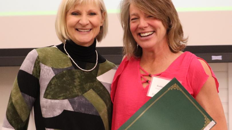 Bobbie with Sue Mehrer at 2022 holiday award ceremony