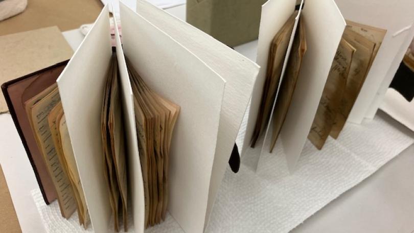flood-damaged diaries drying out