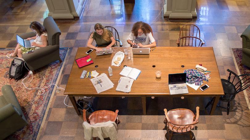 Students study in the East Reading Room in the Dartmouth Library