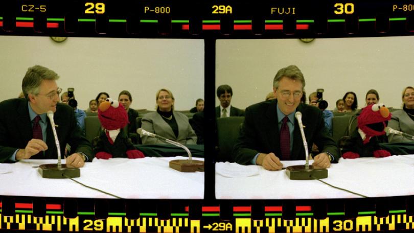2002 photo depicts Elmo testifying on behalf of music education