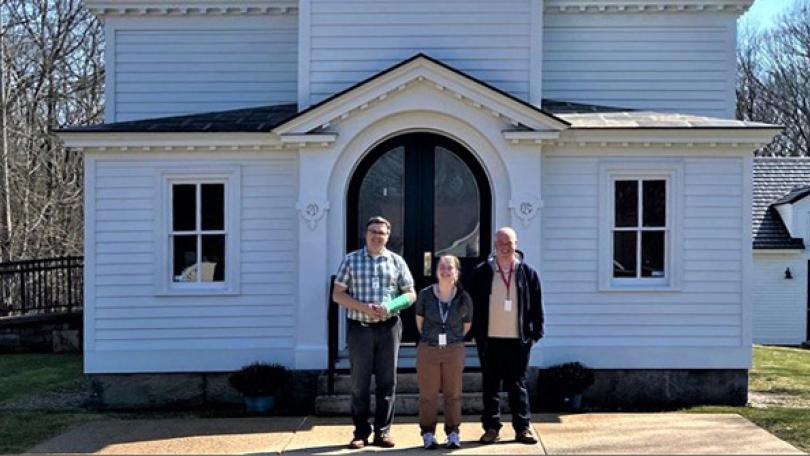 David Freeburg, Madeleine Hutchins, and Jason LaVigne in front of the Mohegan Church in Uncasville, CT