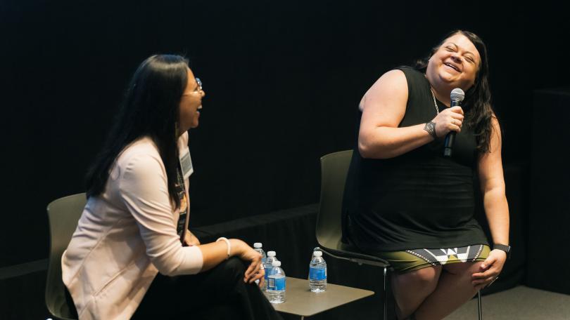 Miranda Belarde-Lewis and Jami Powell are in conversation on stage at the Advancing Pathways Colloquium 