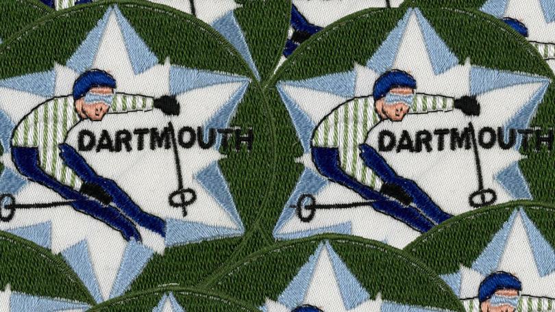 Repeating patches show a Dartmouth skier