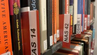 Books on shelf with Course label NAS 14