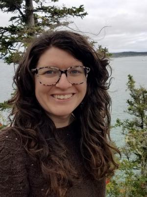 portrait of Rose with trees and bay in bachground