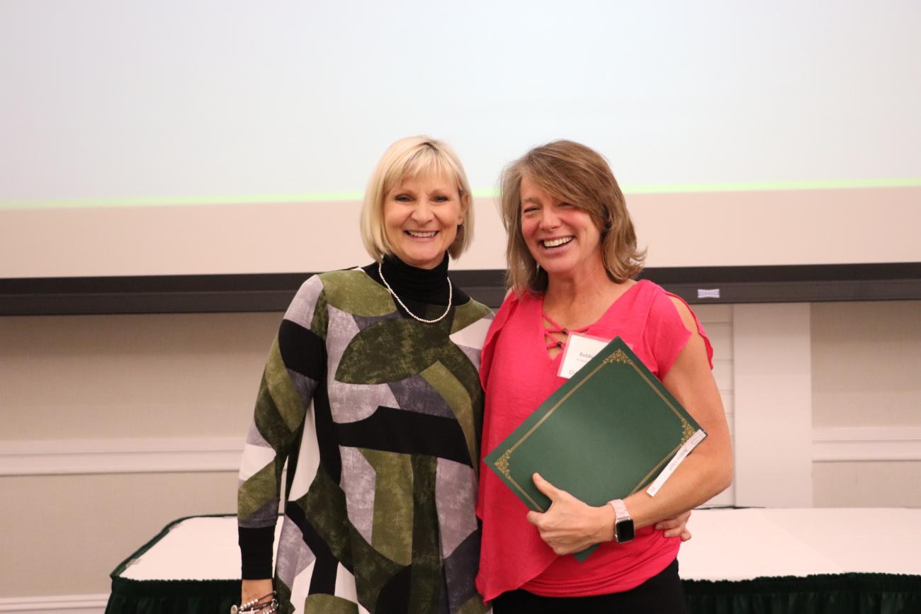 Bobbie with Sue Mehrer at 2022 holiday awards ceremony