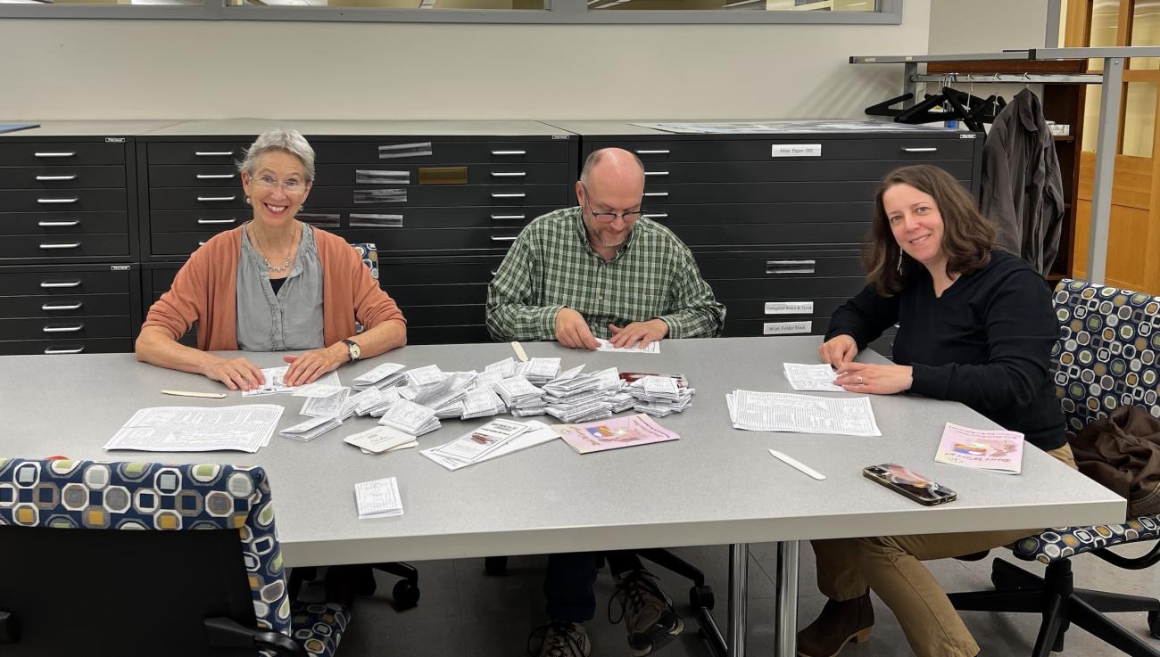 from left, Deborah Howe, Kent Randell, and Este Pope fold zines