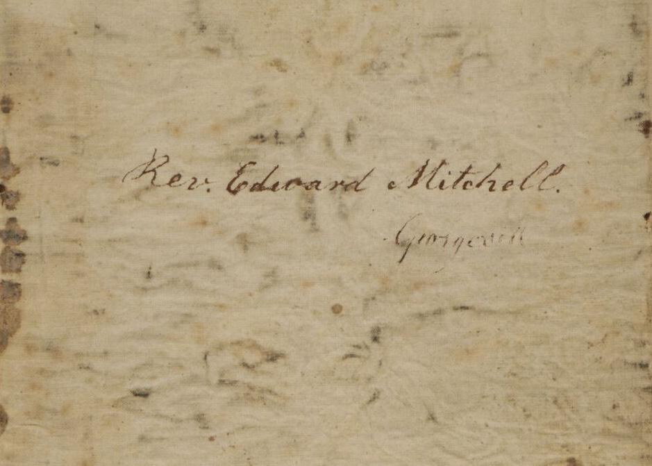 Rev. Edward Mitchell, written on the front cover of a brown notebook