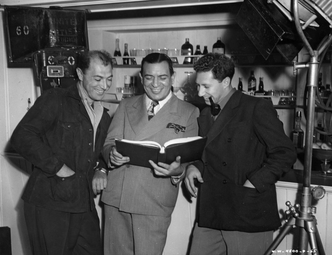 Maurice Rapf, Charles Reisner, and Budd Schulberg, from a Walter Wanger Productions publicicty shot for Winter Carnival.