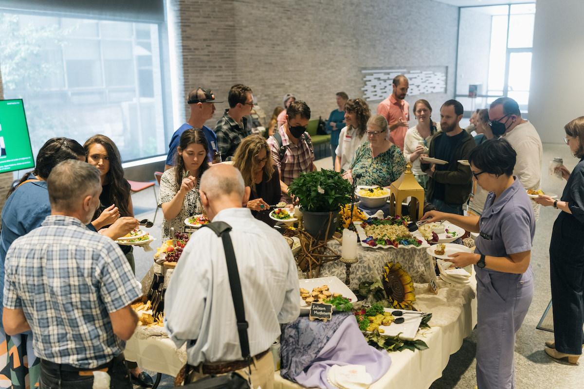 the Advancing Pathways Colloquium attendees enjoy lunch together on the last day of the event