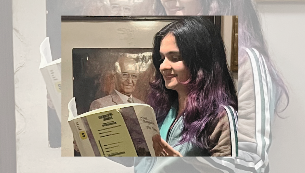 Sreevalli Sreenivasan, Th’17 and current Thayer PhD candidate holds her grandfather's book, sourced by interlibrary loan