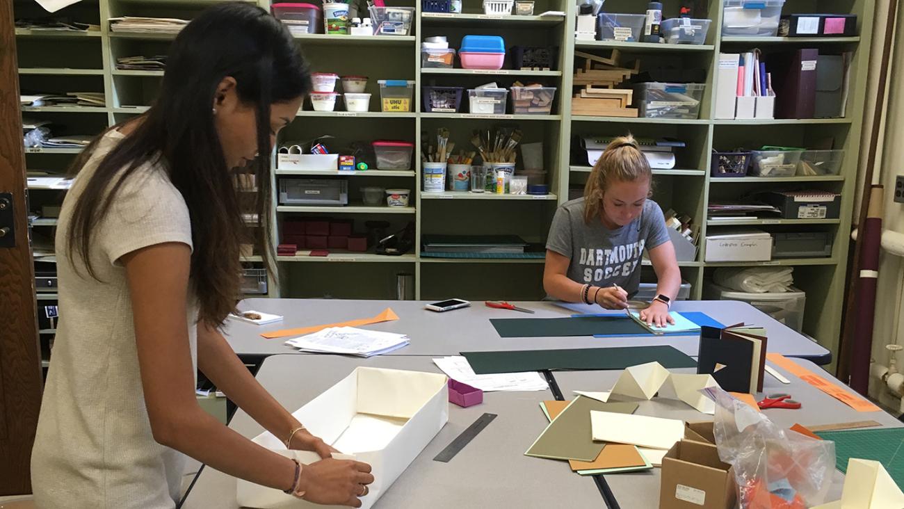 students making books in the bookbinding studio