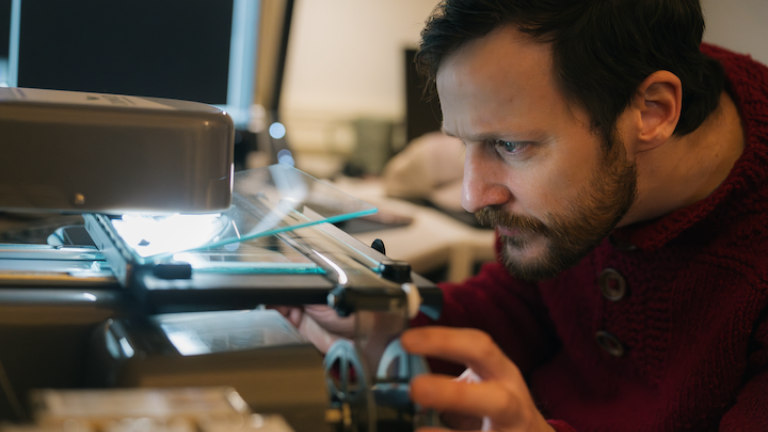 Toben Traver works on his digitization project
