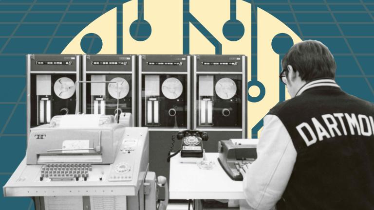 man in front of old computer terminal